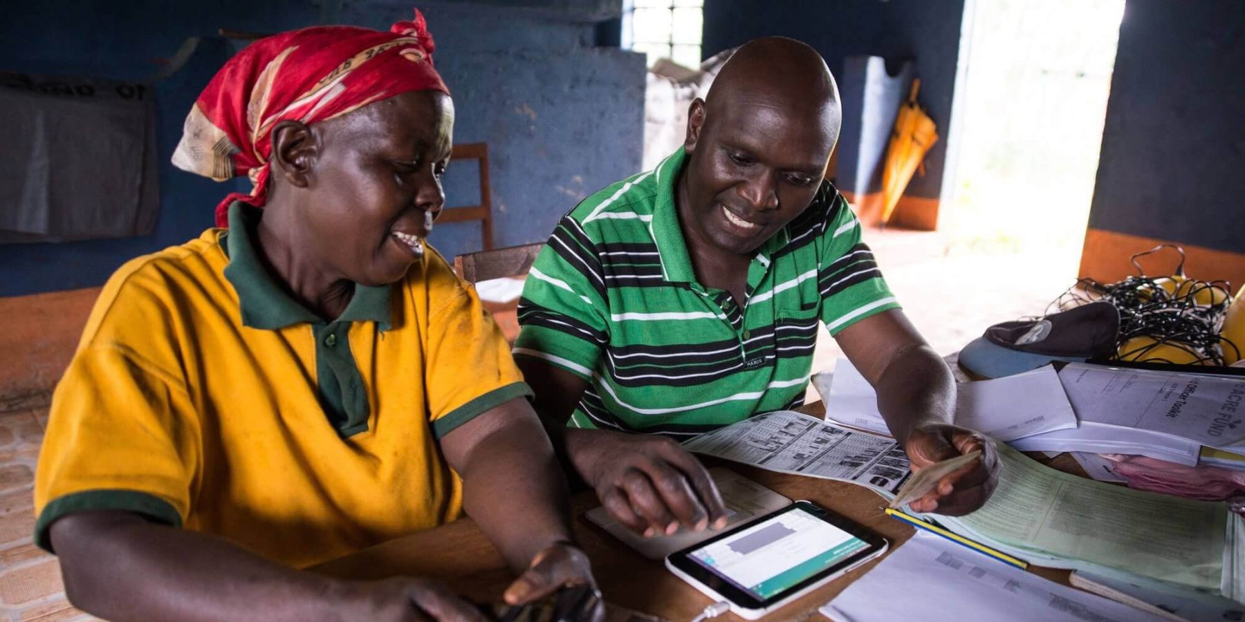 OAF Kenya - Field Officer using a tablet to register a farmer